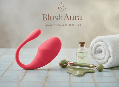 BlushAura pink  wellness gadget in spa setup with eucalyptus oil, jade roller, gua sha tool, and rolled towel on tiled surface. Redefined self-care routine for relaxation, premium wellness accessories online India.